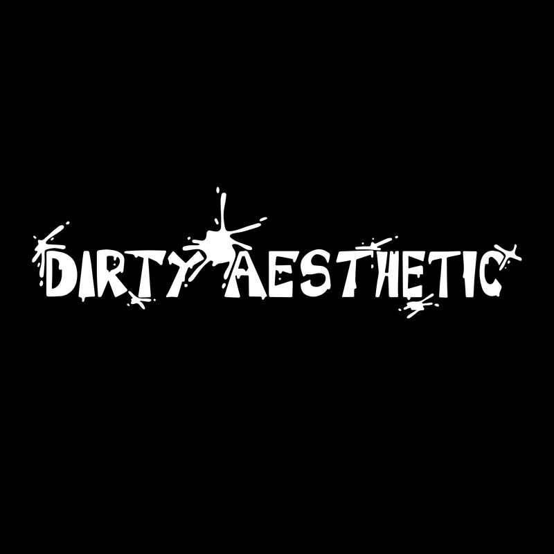 Dirty Aesthetic wordmark in white paint splatter lettering on a plain black background
