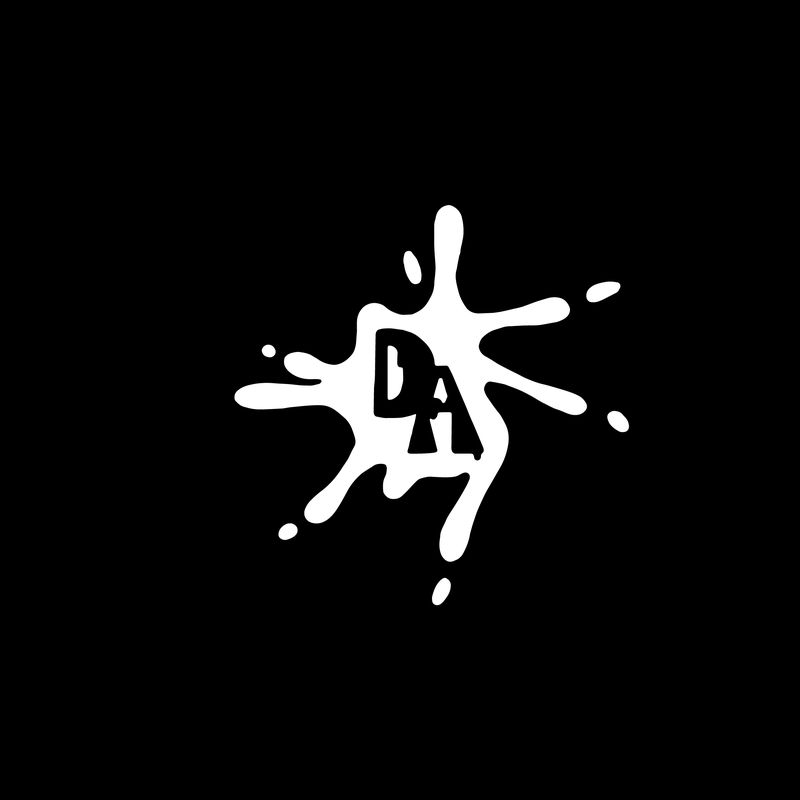 Dirty Aesthetic DA monogram set inside a white paint splat on a black background
